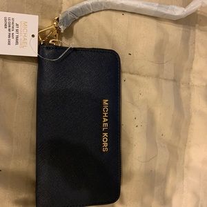 Michael Kord navy wristlet wallet